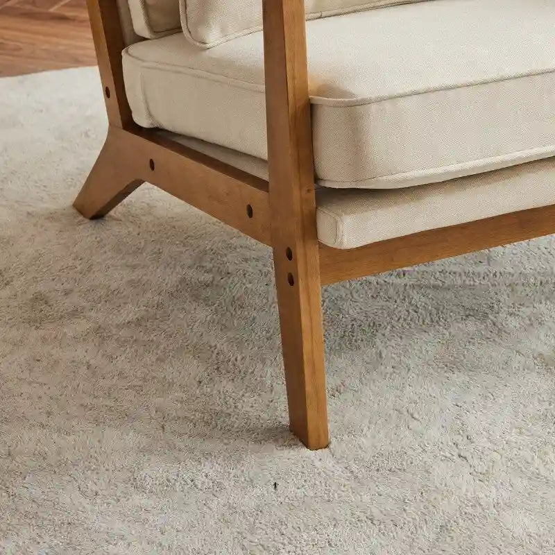 Poltrona d'accento rivestita in misto lino con gambe in legno e cuscino, beige